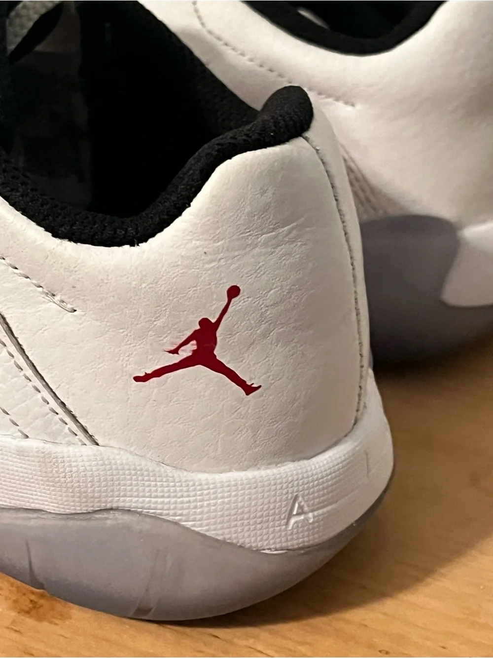 Jordan Kids White Sneakers with Red Jumpman Accent